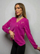 Fuchsia blouse with V-neckline