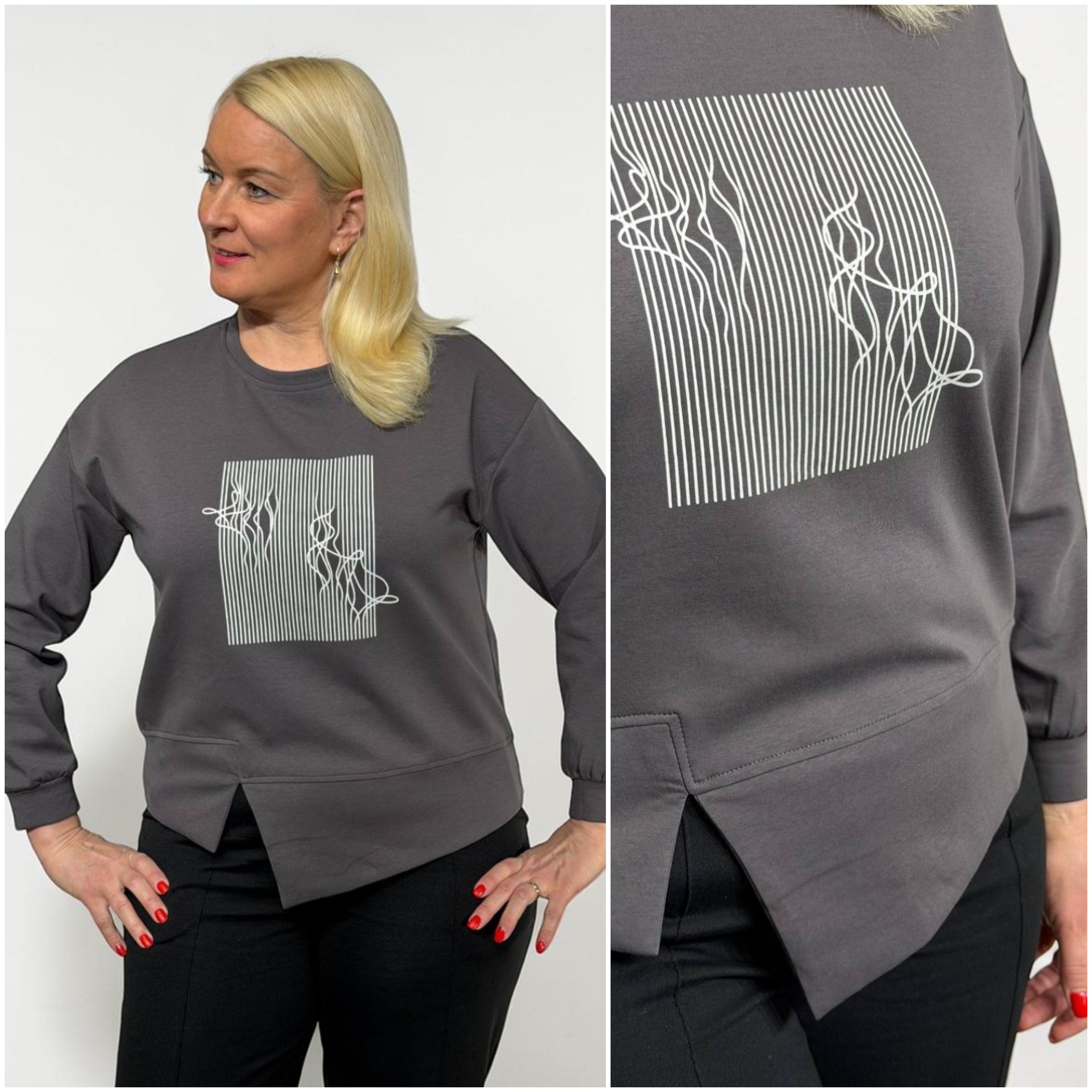 Plāns kokvilnas džemperis ar šķēlumu