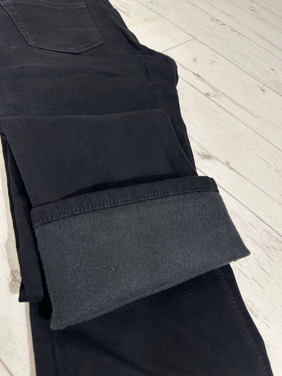 siltināti sieviešu džinsi