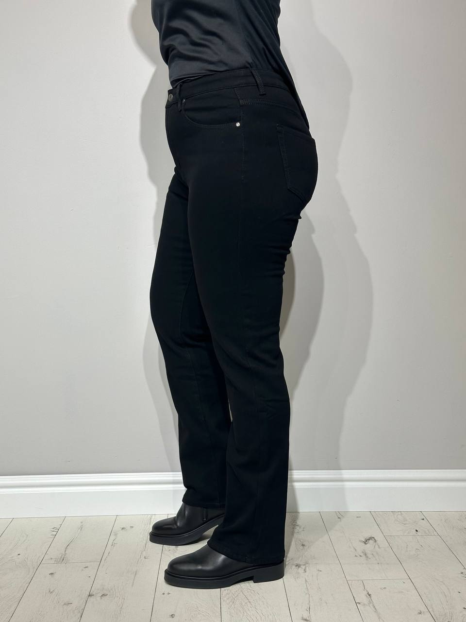 siltināti sieviešu džinsi