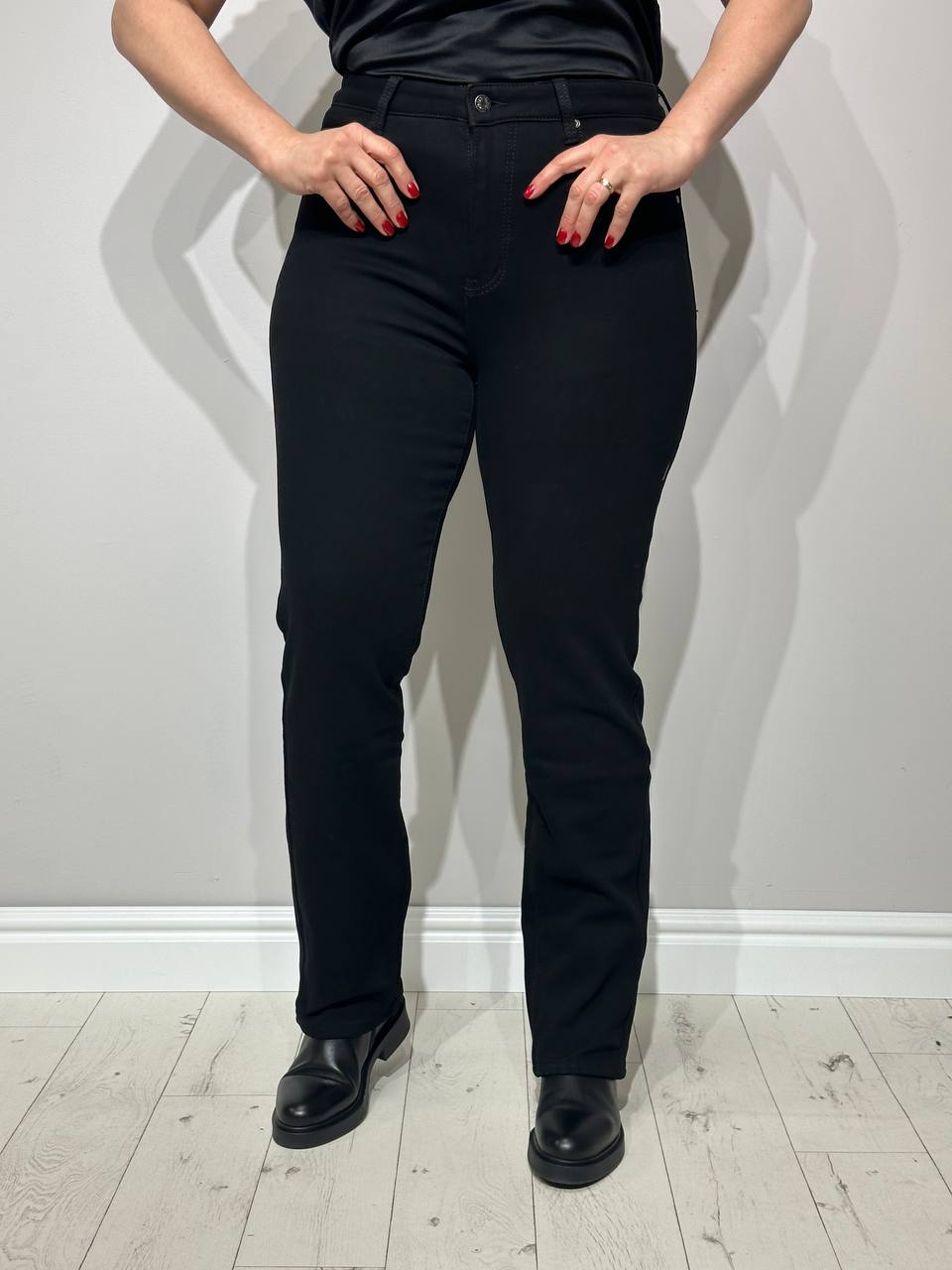 siltināti sieviešu džinsi