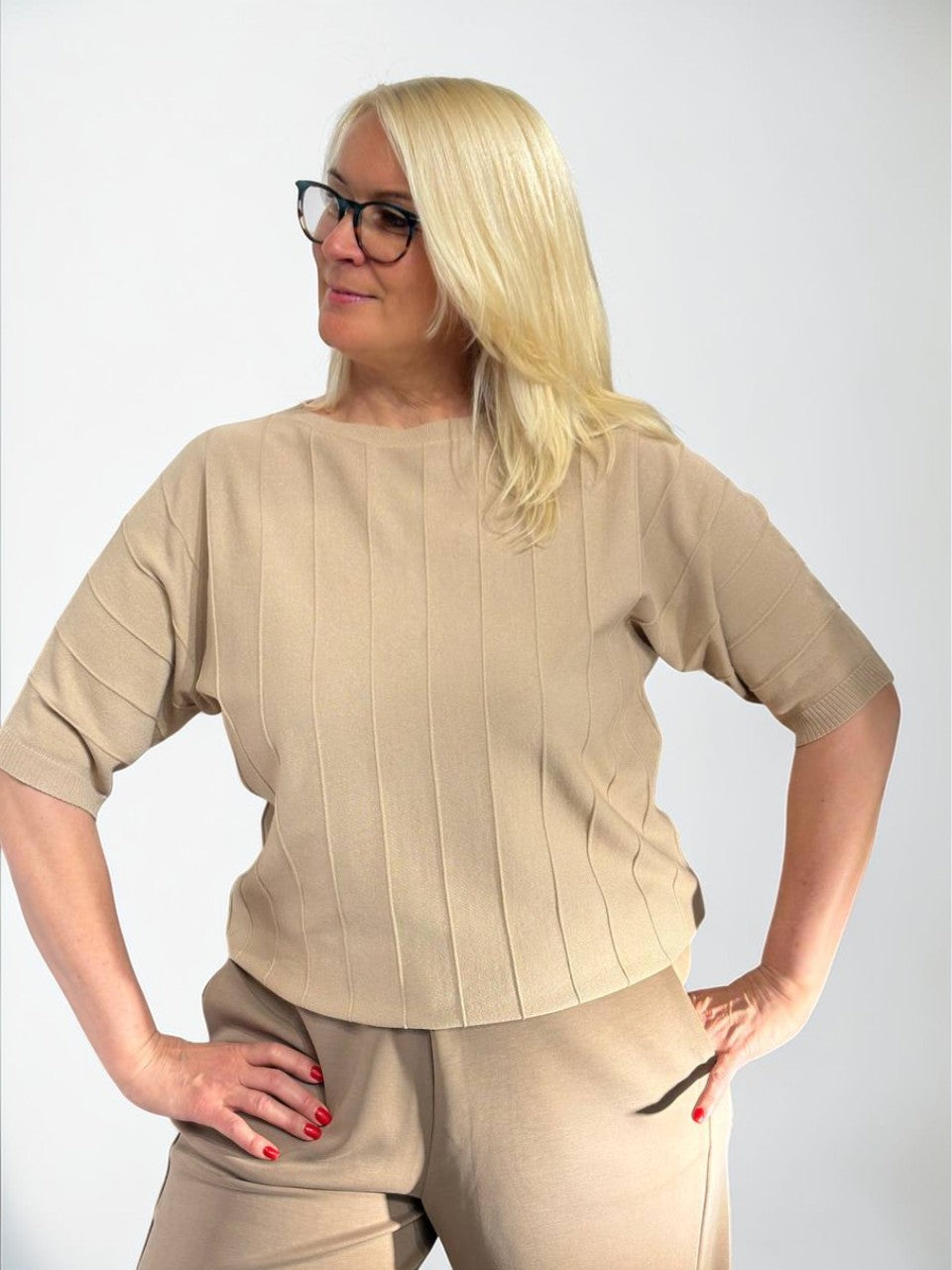 Laisvo kirpimo megztas viršus