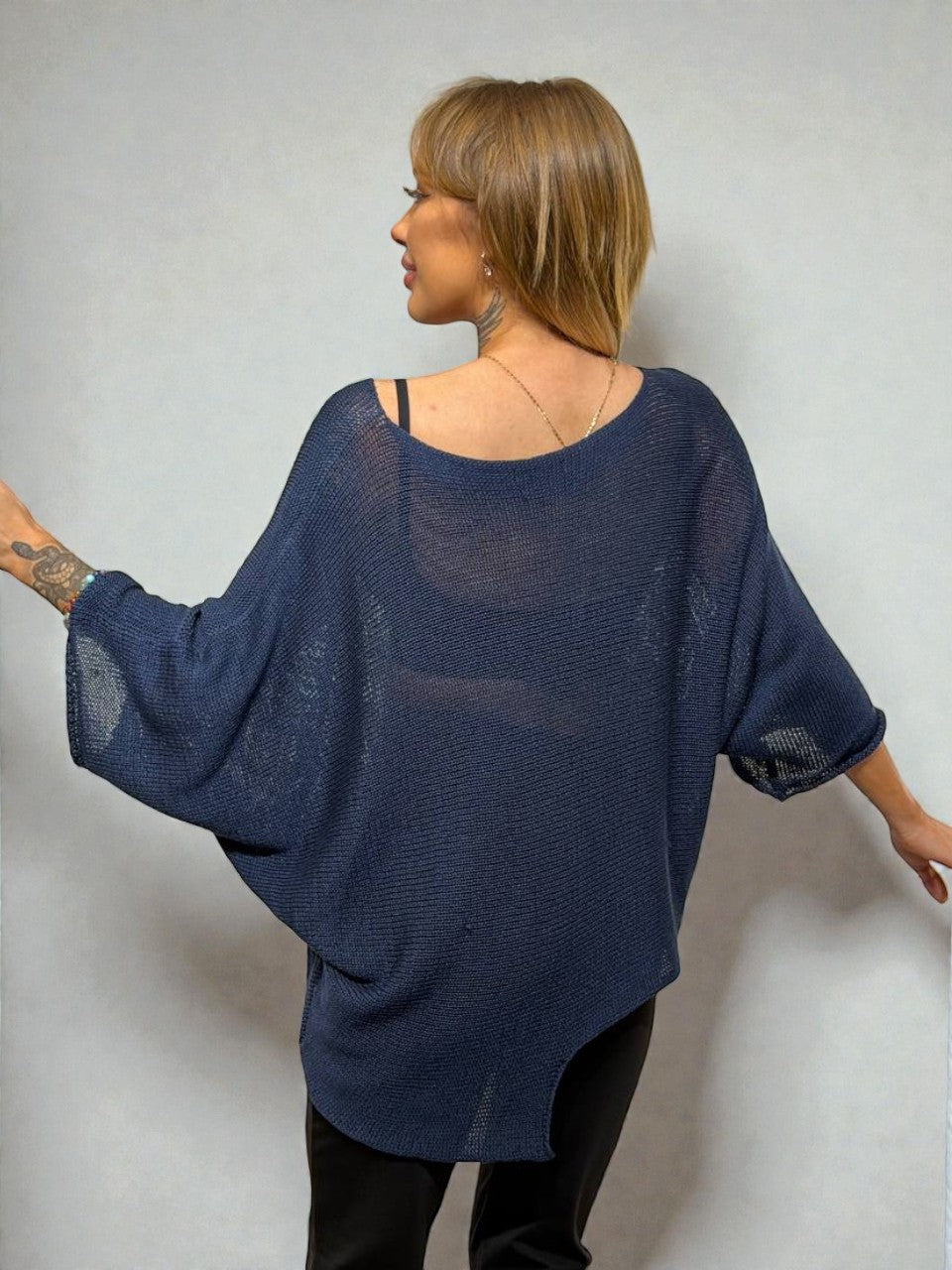 Asimetrisks adīts džemperis