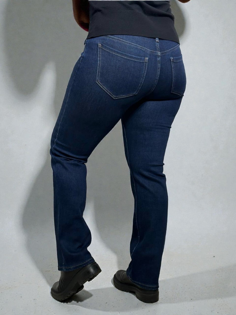 Lengthened, straight blue jeans for women