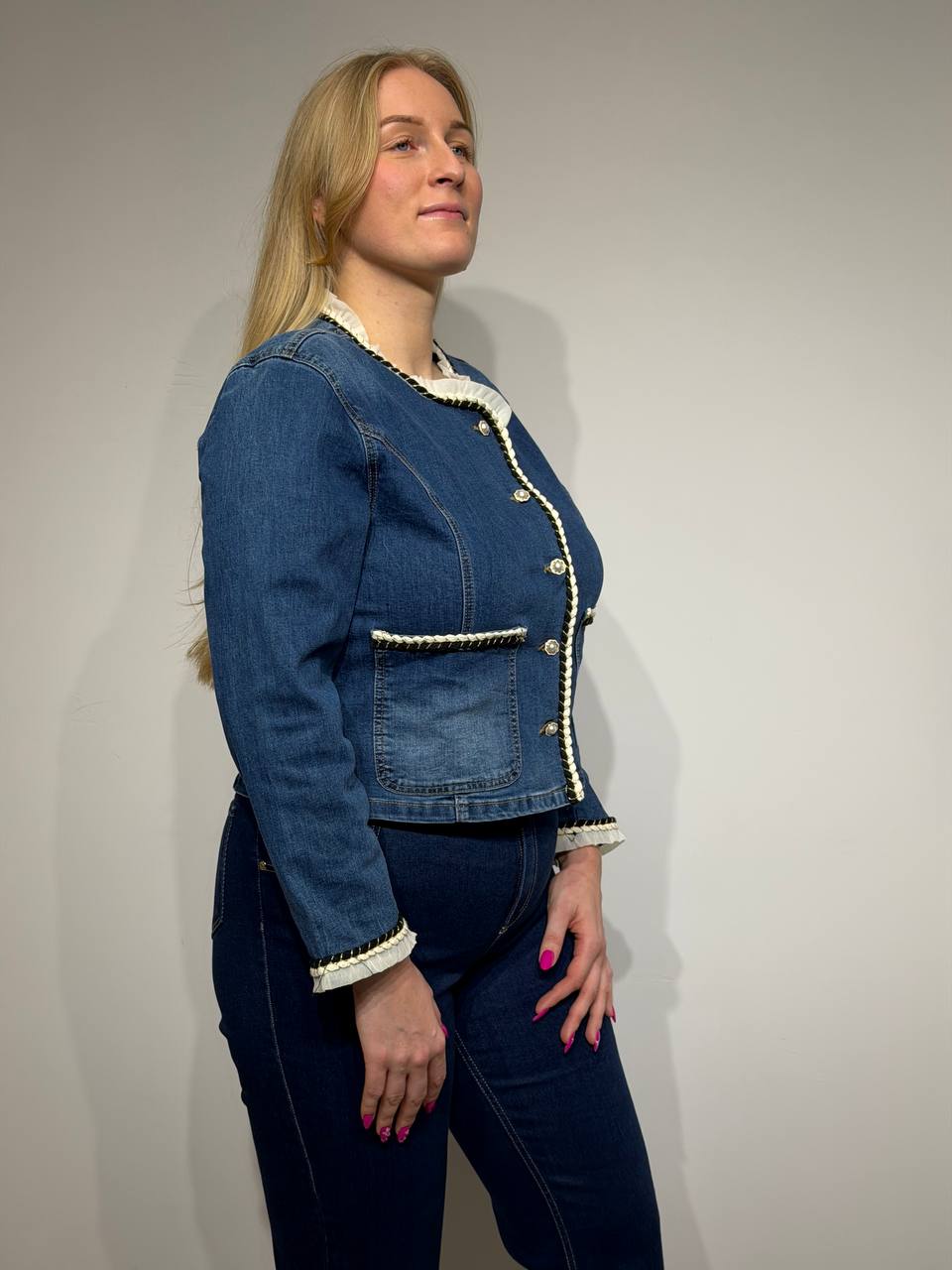 Elegant denim jacket with decorative trim