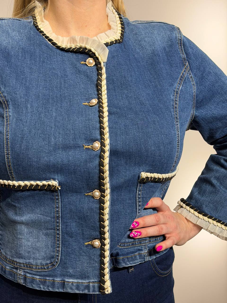 Elegant denim jacket with decorative trim