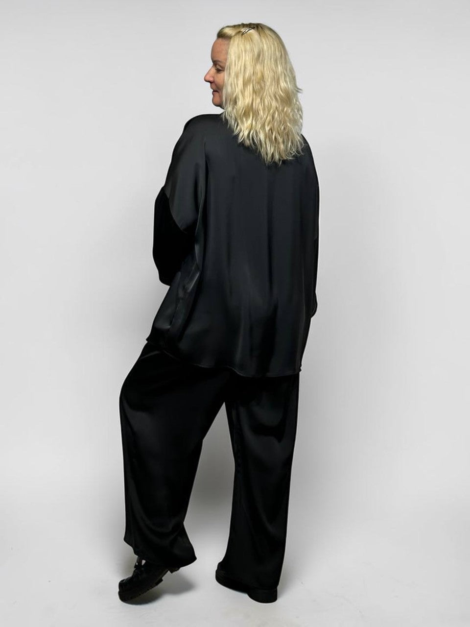 Išskirtinis kostiumas moterims