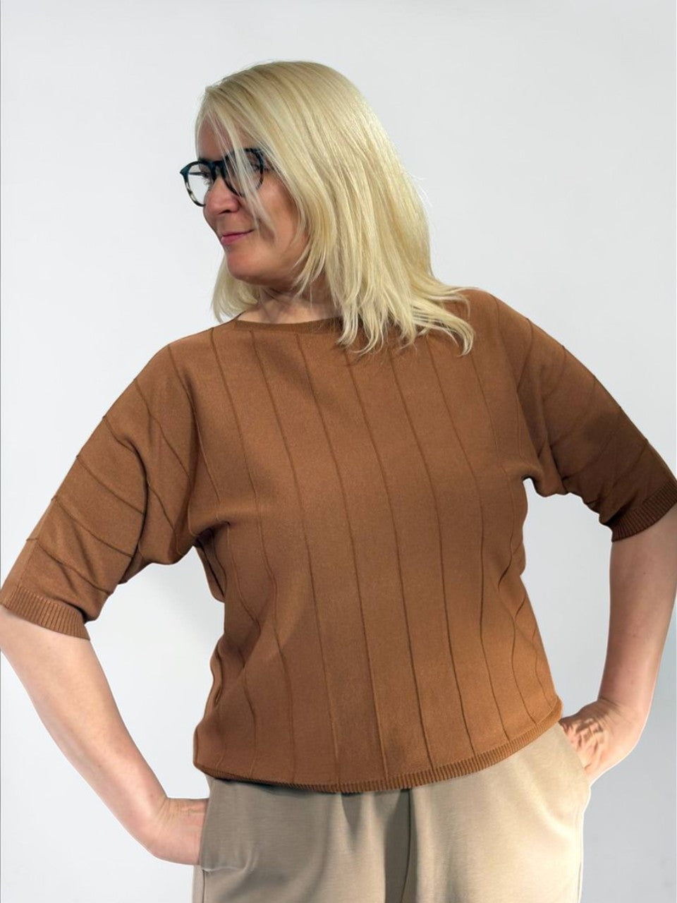 Laisvo kirpimo megztas viršus