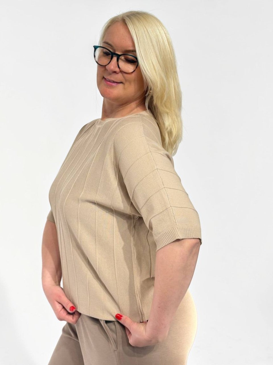 Laisvo kirpimo megztas viršus