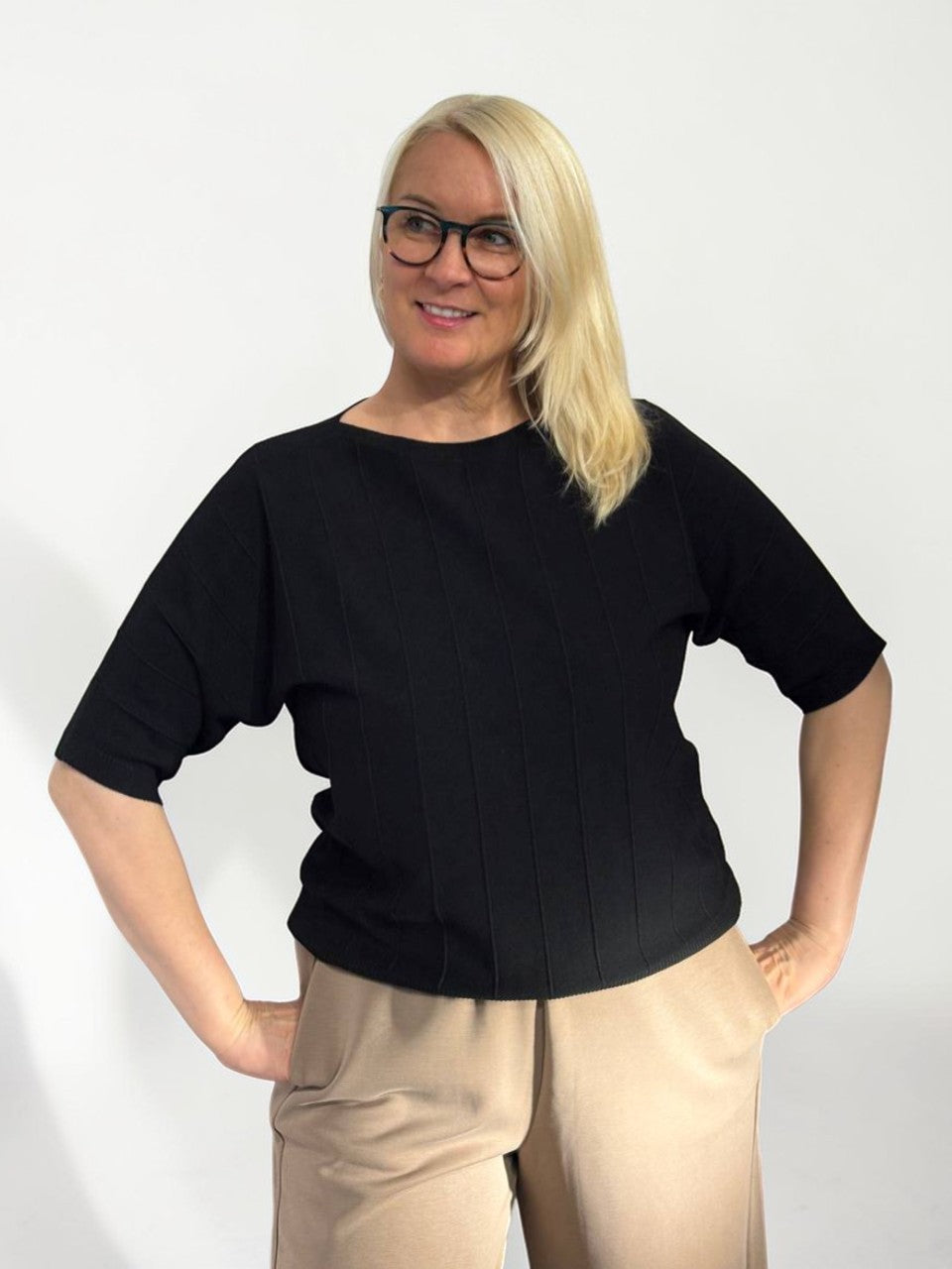 Laisvo kirpimo megztas viršus