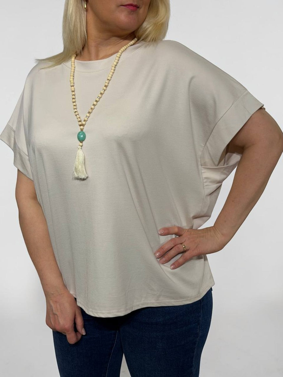 Lielizmēra tops ar krellēm