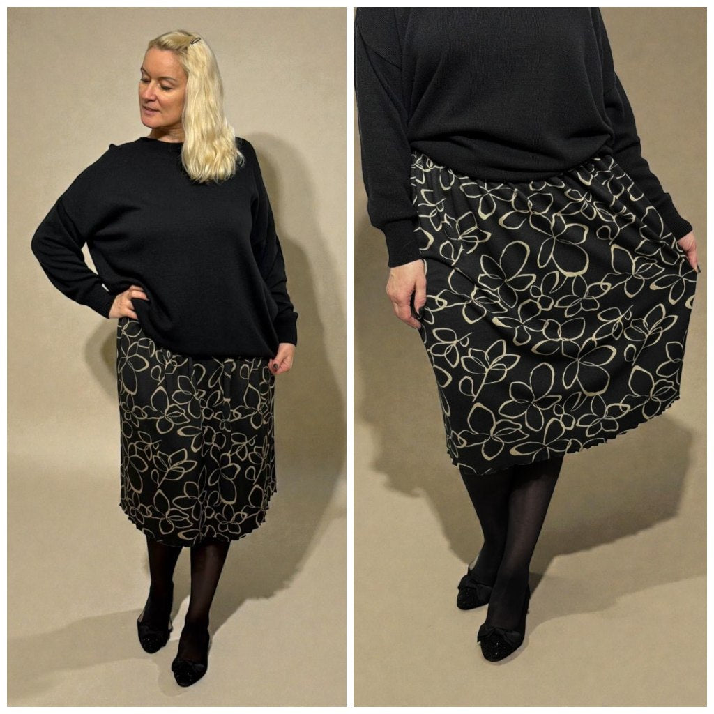 Midi svārki ar ziedu rakstu